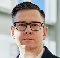 Alexander Hughes, CEO eines Krypto-Trading-Unternehmens, Porträt einer Führungskraft